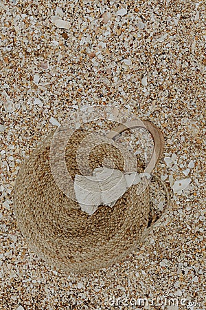 Handmade beach bag left in the sand Stock Photo