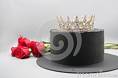 Handmade black cake with a crown Stock Photo