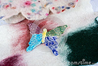 Handmade butterfly on the colorful fabric Stock Photo