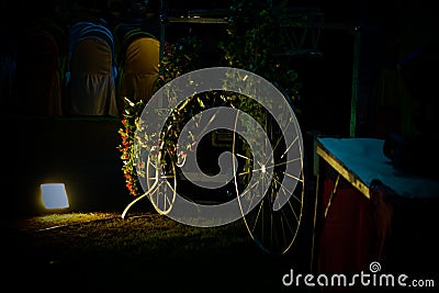 Handmade bycycle with baskets of flowers light focus on bycyle Stock Photo