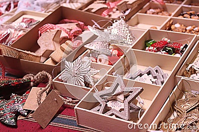 Handmade Christmas decorations exposed on advent market stall Stock Photo
