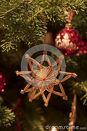 Handmade christmas ornament on a pine christmas tree Stock Photo