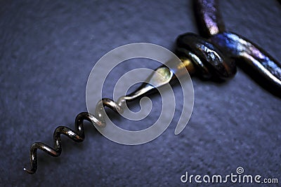 Handmade corkscrew on shale Stock Photo
