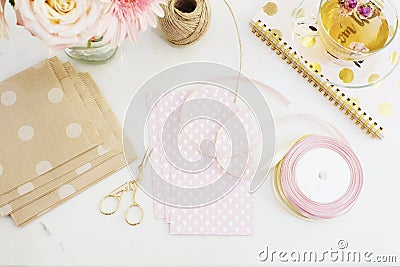 Handmade, craft concept. Handmade goods for packaging - twine, ribbons. Feminine workplace concept. Freelance fashion femininity w Stock Photo