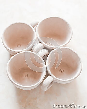 Handmade crafts clay pottery cups nude texture beige skin color bowl natural color eco friendly Stock Photo