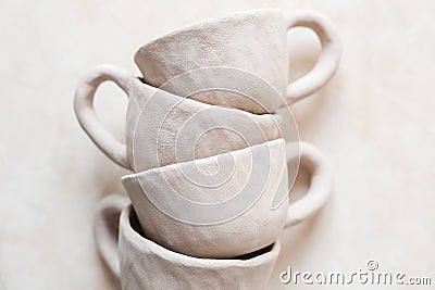 Handmade crafts clay pottery cups nude texture beige skin color bowl natural color eco friendly Stock Photo