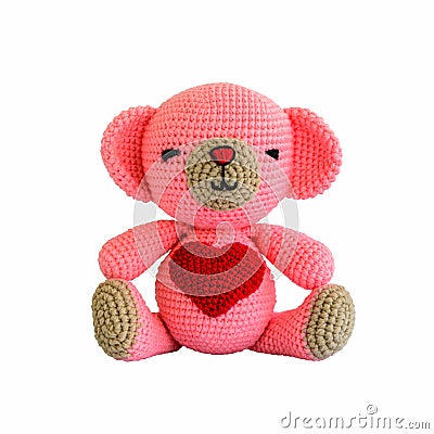 Handmade crochet pink bear doll Stock Photo