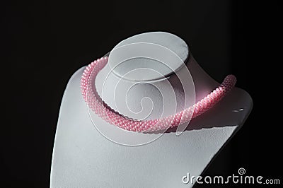 Handmade crocheted necklace from pink beads Stock Photo