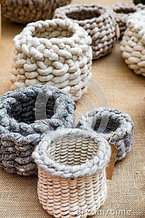 Handmade crocheted sheep wool baskets Stock Photo