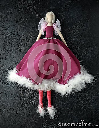 Handmade doll tilda in beautiful dress with white hair Stock Photo