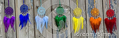 Handmade dream catcher with feathers threads and beads rope hanging Stock Photo