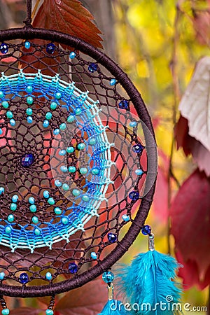 Handmade dream catcher with feathers threads and beads rope hanging Stock Photo