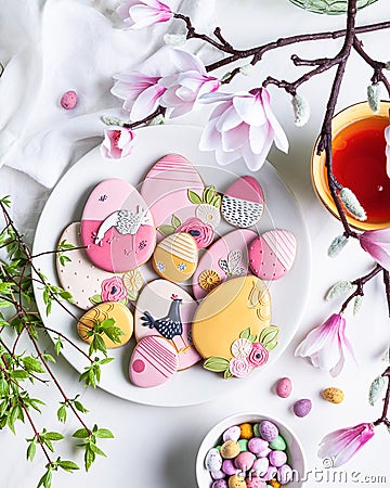 Handmade Easter gingerbread cookies and chocolate eggs Stock Photo