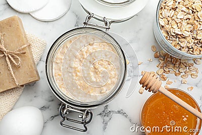 Handmade face mask and ingredients on white marble table Stock Photo