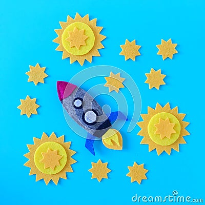 Rocket and Stars Felt Toys On Blue Background Stock Photo