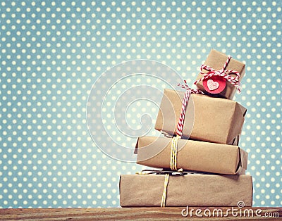 Handmade gift boxes over polka dots background Stock Photo