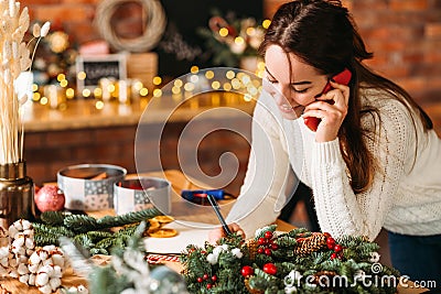 Handmade gift shop lady receiving order phone Stock Photo