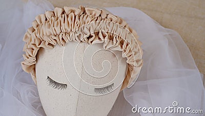 Handmade headband made out of cotton fabric texture with ruffle pattern Stock Photo