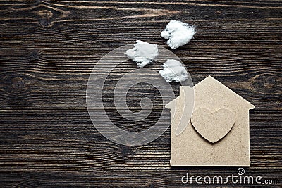 Handmade home symbol with heart shape and smoke from the chimney Stock Photo