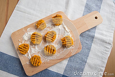 Handmade italian pumpkin gnocchi Stock Photo