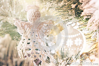 Handmade knitted angel on christmas tree Stock Photo