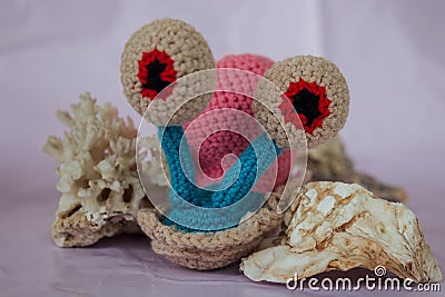 handmade knitted soft toy snail Harry Stock Photo