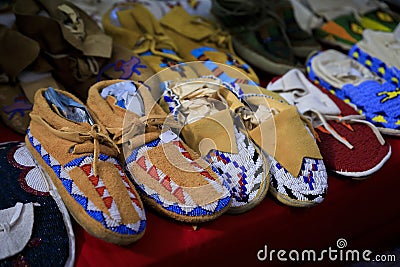 Handmade leather Native American Indian moccasins at a powwow in San Francisco Stock Photo