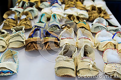 Handmade leather Native American Indian moccasins at a powwow in San Francisco Stock Photo