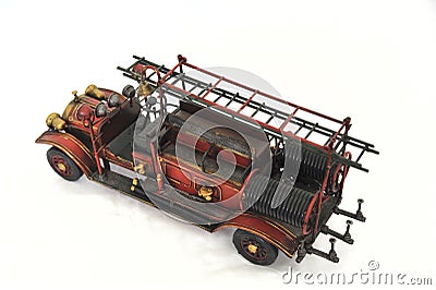 Handmade lifelike model of a old firetruck. Home and office decoration Toy. Stock Photo