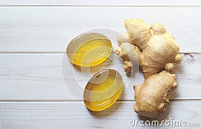 Handmade natural honey ginger soap on white wood background Stock Photo