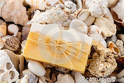 Handmade natural organic soap on seashells background Stock Photo
