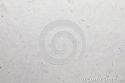Handmade paper texture with recycled materials. Stock Photo