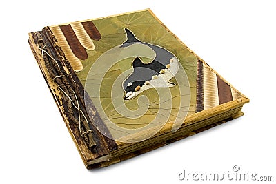 Handmade photo album with dolphin on the cover. Stock Photo