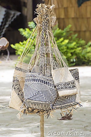 Handmade raffia bags on South Pacific Island Stock Photo