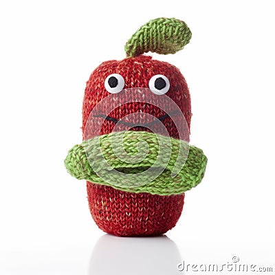 Handmade red apple shy knitted puppet toy with funny face. Generative AI Stock Photo