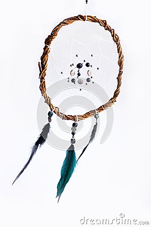 handmade round dream catcher made of willow vines, white threads, beads Stock Photo