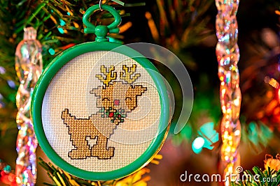 RUdolph the red nosed reindeer handmade cross stitched Christmas tree ornament Christmas card Stock Photo