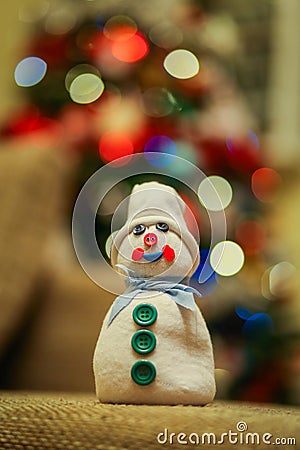 Handmade snowman made from a sock filled with rice and decorated with buttons Stock Photo