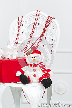 Handmade snowman and red gift box Stock Photo
