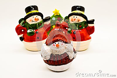 Handmade snowmen figurines isolated on white background. Christmas decoration. Stock Photo
