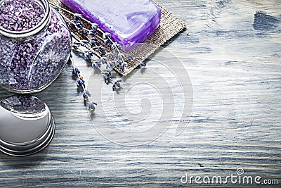 Handmade soap lavender aromatic bath salt jar cover on wooden bo Stock Photo