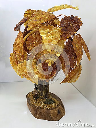Handmade souvenir tree made of many small pieces of natural Baltic amber Stock Photo