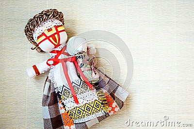 Handmade textile doll, rag doll 'Motanka' in ethnic style, ancient culture folk crafts tradition of Ukraine. Stock Photo