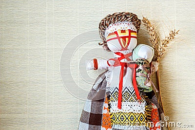 Handmade textile doll, rag doll 'Motanka' in ethnic style, ancient culture folk crafts tradition of Ukraine. Stock Photo