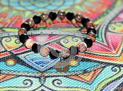 Handmade unique bracelet from mineral beads Stock Photo