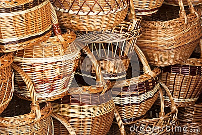 Handmade willow wicker baskets background Stock Photo