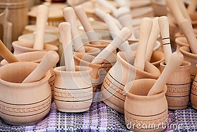 Handmade wooden pounder, pestle handicraft market Stock Photo