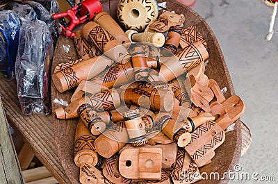 Handmade wooden whistles that mimic sounds of birds sold at handicraft fairs in Brazil. Stock Photo