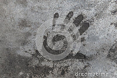 Handprint on cement. Memorable handprint of a hand in an old concrete wall. Copy space for text Stock Photo