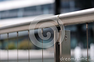 Handrail of a bannister of stainless steel Stock Photo